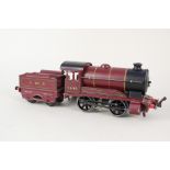 Hornby 0 gauge clockwork 0-4-0 loco and tender,