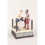 An iron mechanical boxing bank