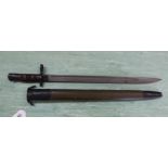 A model 1917 Enfield bayonet by Remington with scabbard dated 1918,