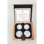 A cased 1976 Montreal Olympics silver proof coins,