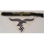 A Third Reich era cuff-title 'Wehrmacht Verkehrsdirektion Paris' (traffic directorate) with an