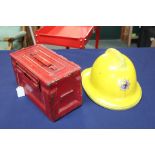 A Firemans helmet (dated 1986) with a painted ammo can and contents including cloth helmet etc