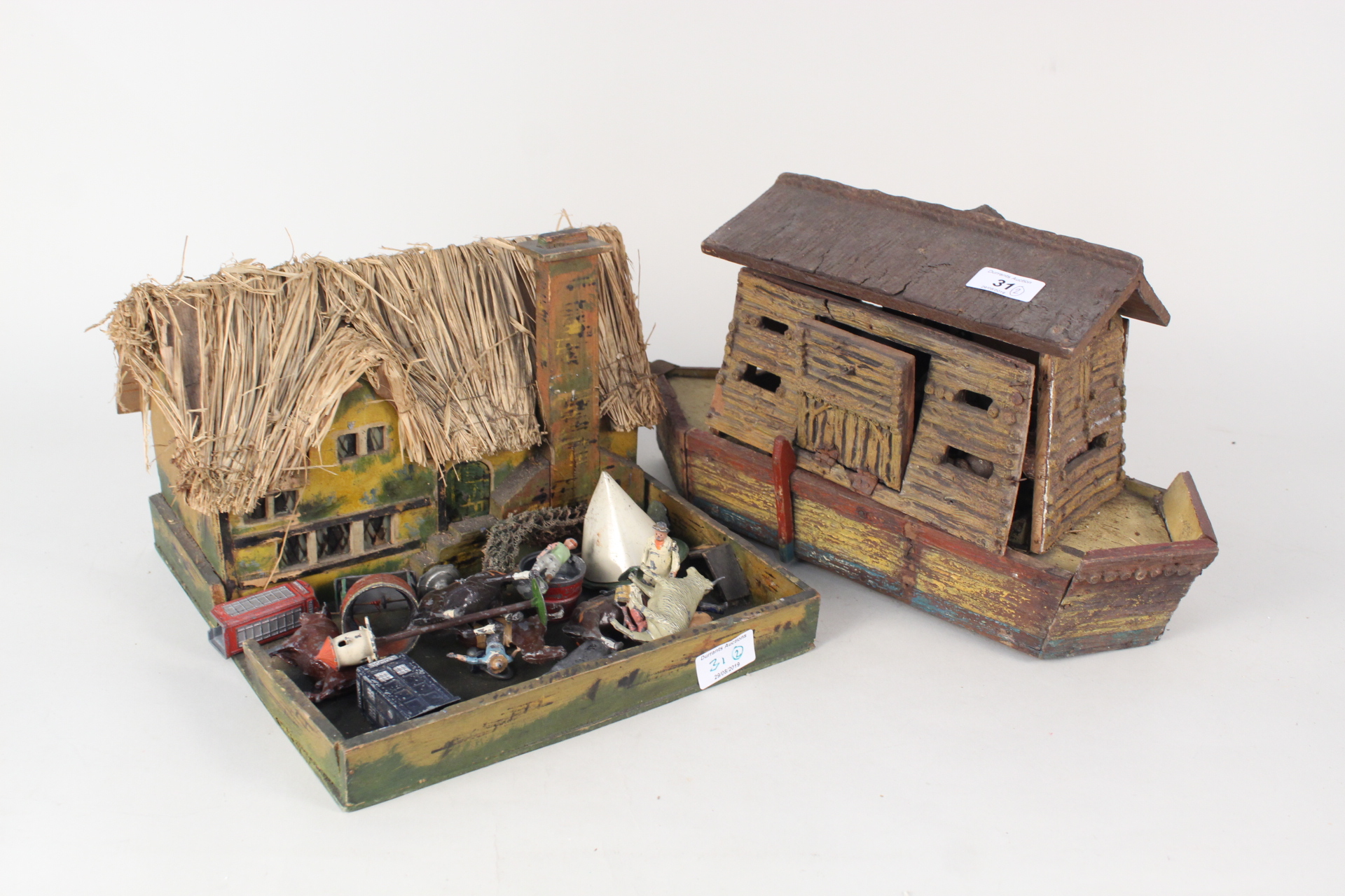 A wooden Noahs Ark and industrial building containing a large quantity of lead,