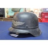 A German Third Reich era Luftschutz Civil Defence helmet (liner as found)