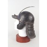 A Cromwellian style lobster tail helmet,