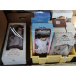 Nine various boxed porcelain dolls