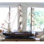 A wooden model sailing ship