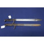 A German 1st model 1898 bayonet (one-piece grip) with two German model 1898/05 bayonets (both as