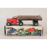 A boxed Triang minic mechanical horse and log lorry