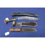 A Kukri with brass fittings and a British Army style survival knife,