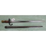 A French model 1874 (Gras) bayonet dated 1875 with scabbard,