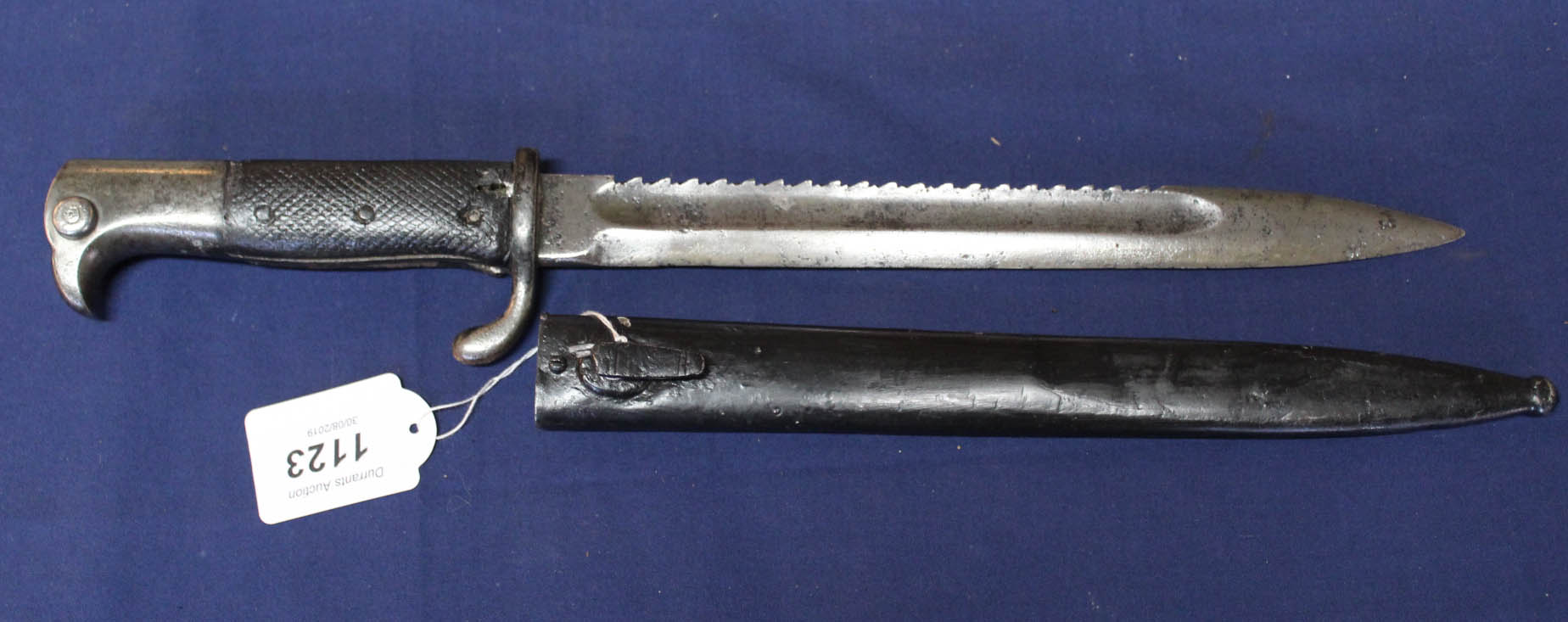 A German WWI era saw back model 1898 (short model) knife bayonet (KS98) with scabbard