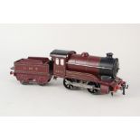 Hornby 0 gauge 0-4-0 clockwork loco and tender,