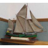 A wooden model Thames sailing barge