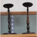 Two turned mahogany candle stands