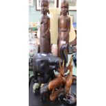 A pair of Masai wood carvings, kitchen scales and weights,