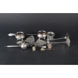 A mixed lot, two silver nurses buckles (one as found), two silver salts, a silver napkin ring,