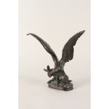 A bronze of an eagle and hare,