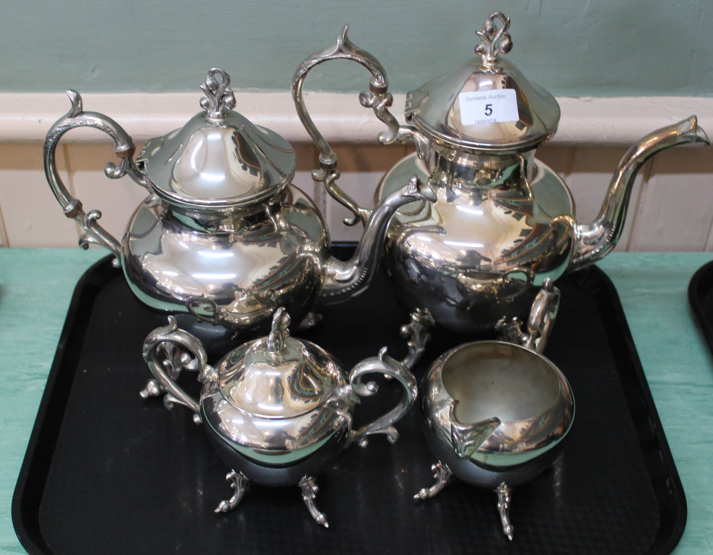 A silver plated four piece tea and coffee set