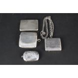 Three silver vesta cases,