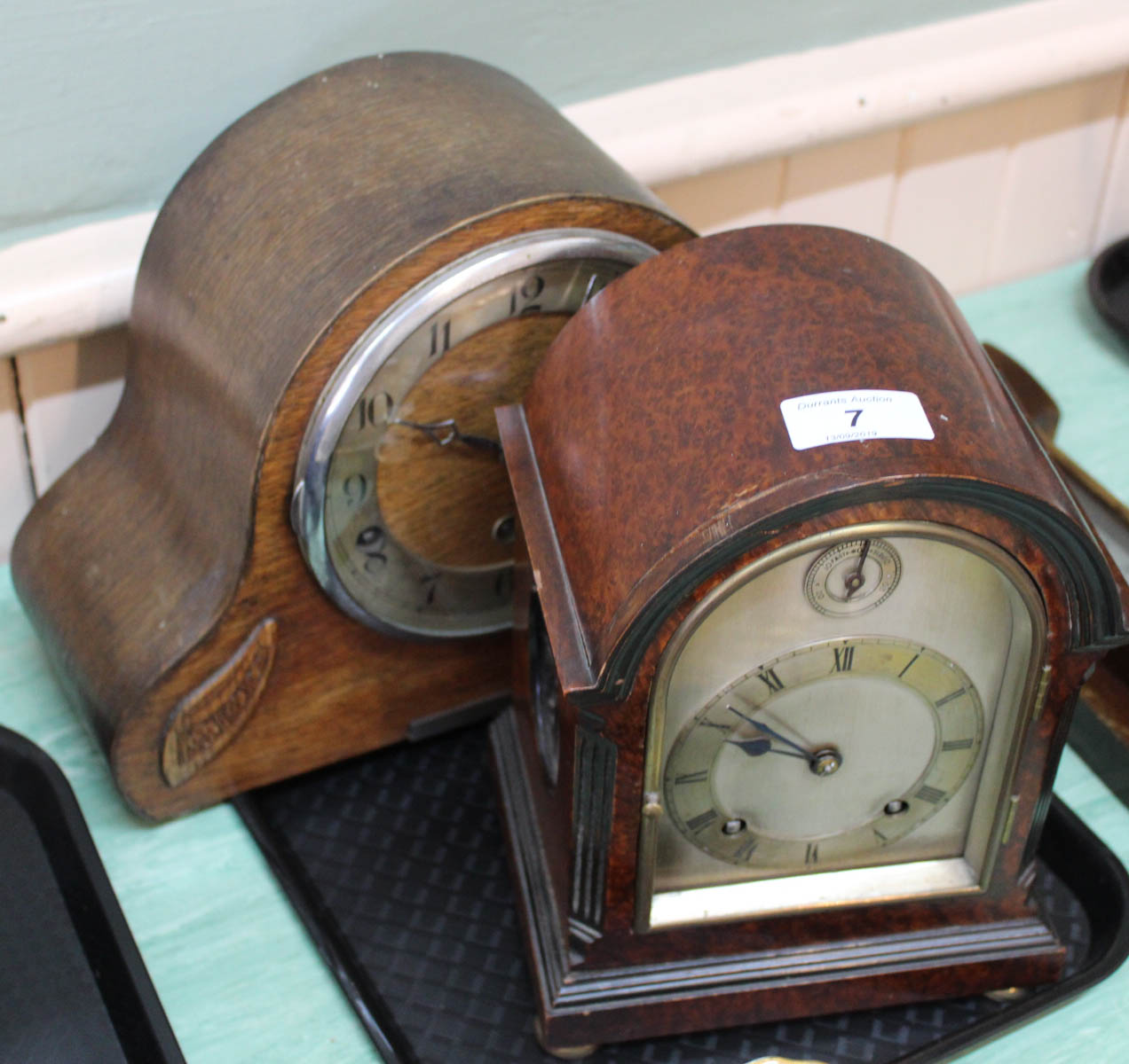 A burr walnut striking mantel clock plus an oak clock