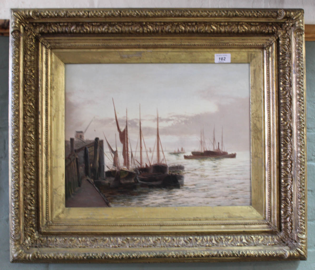 E Fletcher oil on canvas of a port scene with moored vessels,