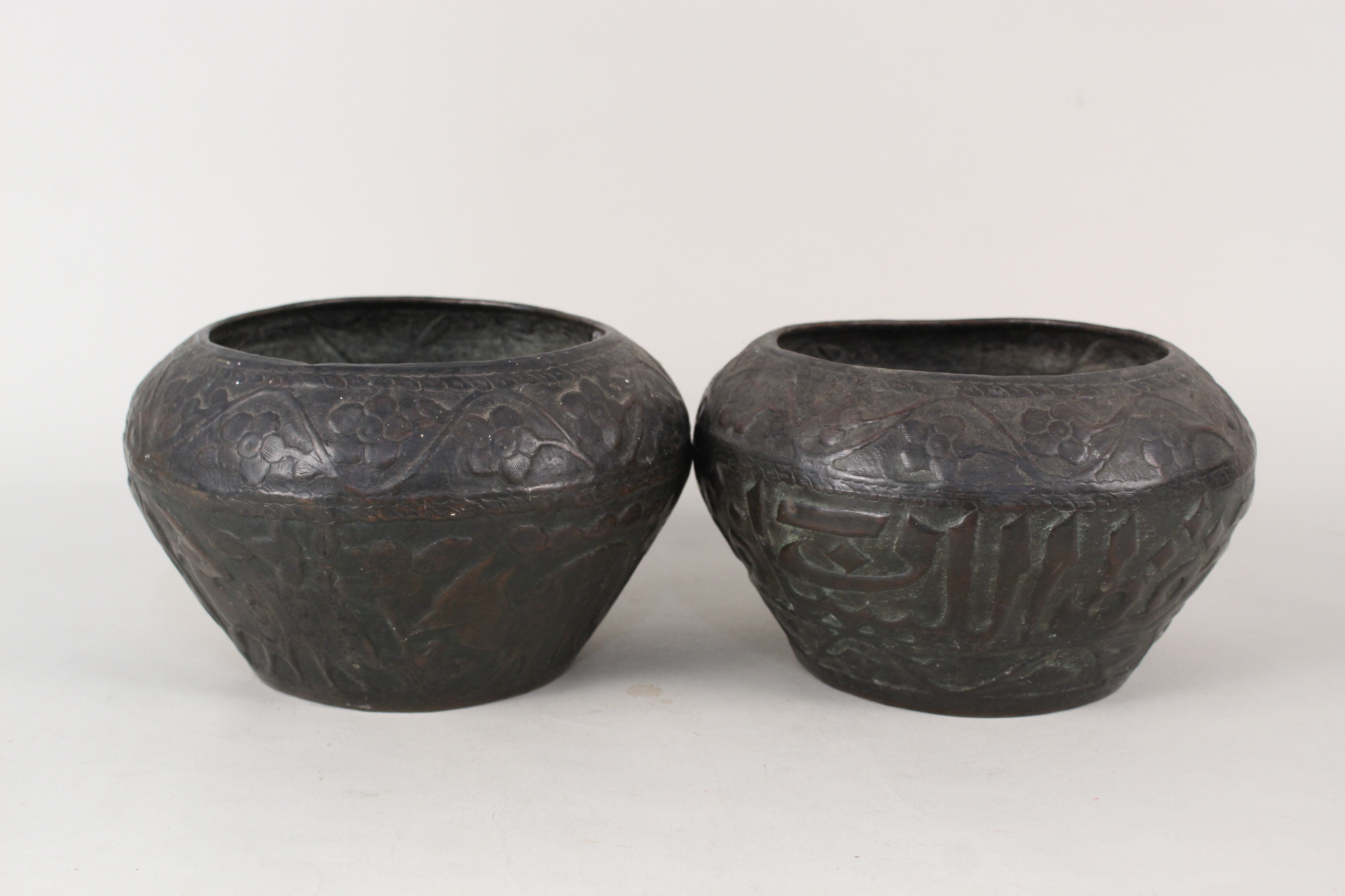 Two 19th Century Islamic brass bowls with animal and calligraphy decoration