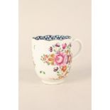 A Worcester cup with floral decoration, fluted top rim and blue internal border,
