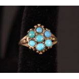 A gold turquoise cluster ring on later shank, stamped 18ct Plat,