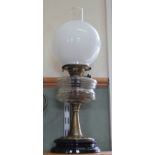 A brass column and glass bowl oil lamp