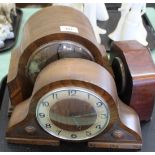 Three oak and walnut mantel clocks