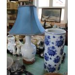 A Japanese blue and white floral stick stand plus two porcelain table lamps