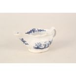 A Lowestoft blue and white patty pan cream boat with two figure porter pattern