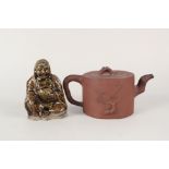 A 19th Century Chinese Yixing teapot with relief Prunus decoration and seal mark plus a Ming
