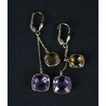 A pair of 9ct gold earrings set with faceted amethyst and citrine stones