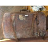 A large leather Gladstone bag