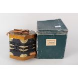 A boxed German concertina