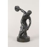 A bronze of a discus thrower,