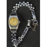 A lady's vintage Unicorn watch in stainless steel case on chrome strap (case is as found)
