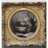 A 19th Century oil on panel of a winter scene with woodcutter and cottage,