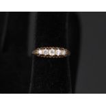 An 18ct gold five stone diamond ring,