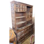 A modern hardwood cupboard dresser with three drawers and part shelf to top