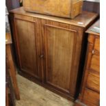 An early Victorian mahogany two door cupboard