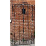 A large iron gate with hinge