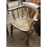 A Victorian beech and elm Captain's chair