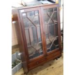 A 19th Century mahogany hanging cabinet with adjustable shelves and two drawers (missing cornice)
