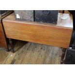 A Victorian mahogany drop leaf table