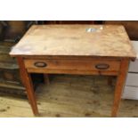 A 1920's pine table with single drawer