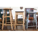 Three assorted wooden stools