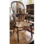 An early Victorian yew and elm Windsor armchair